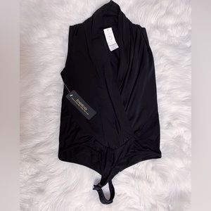 Bebe ruched neckline bodysuit. Brand new with tags. Small